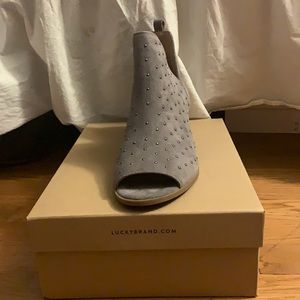 Never before worn peep toe lucky bootie